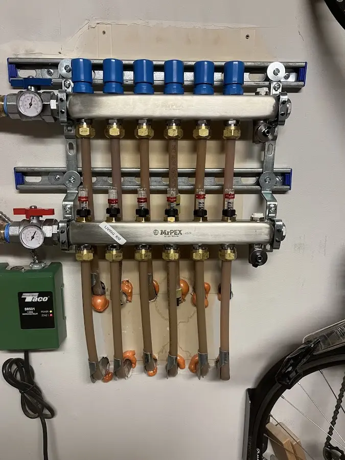 Plumber performing Gas Leak Detection at a residential property in St. Paul